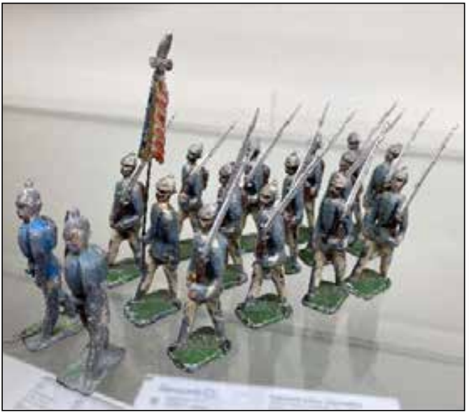 Figure 9: A set of blue McLoughlin figures on parade.