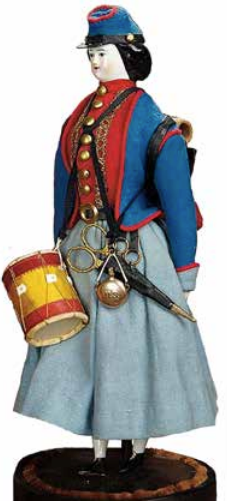 This doll measures eleven inches high and is said to be of German manufacture of the Civil War period.