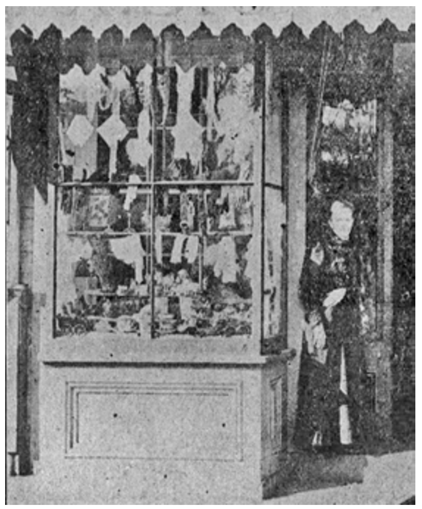 person pictured in the doorway may be Miss Kate France,