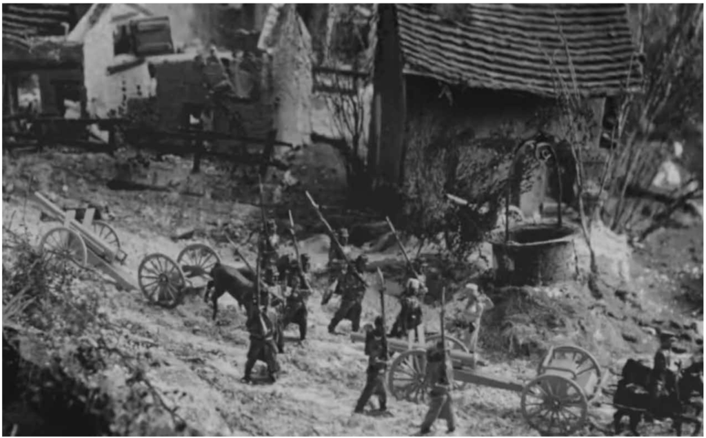 Britains, Paris Office French Infantry, with SR artillery support, march through the village.